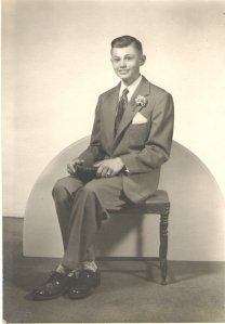 Based on the Bible in his lap, I believe this is a confirmation picture