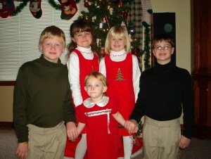 Gruenbaum Kids(and Sam) in Christmas garb